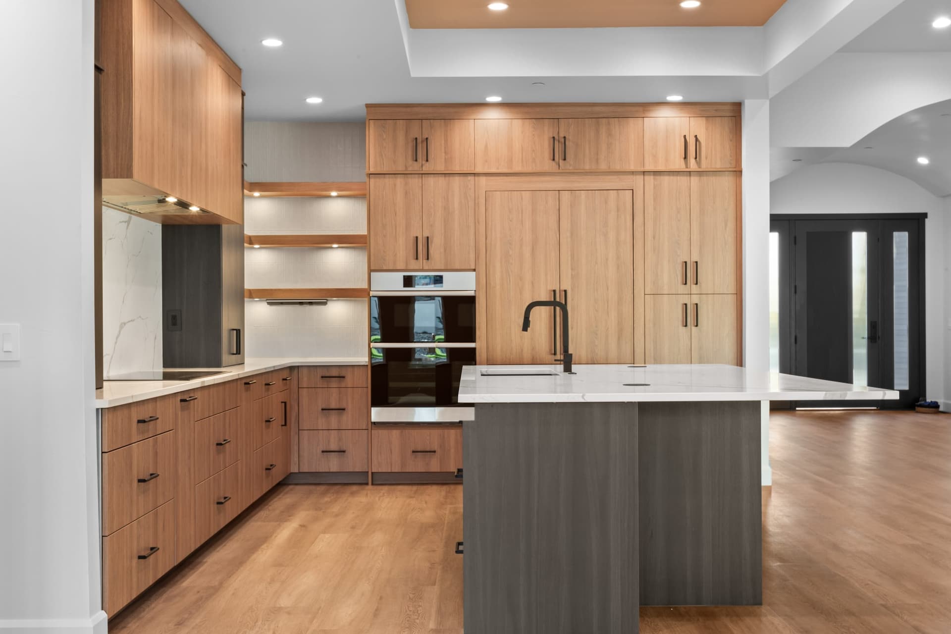 Kitchen appliance wall and cabinetry by Kiefer Built Contracting