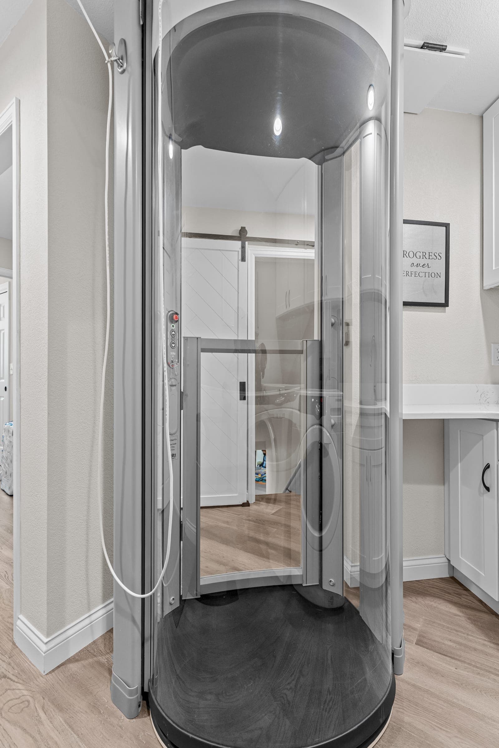Custom residential elevator installed by Kiefer Built Contracting